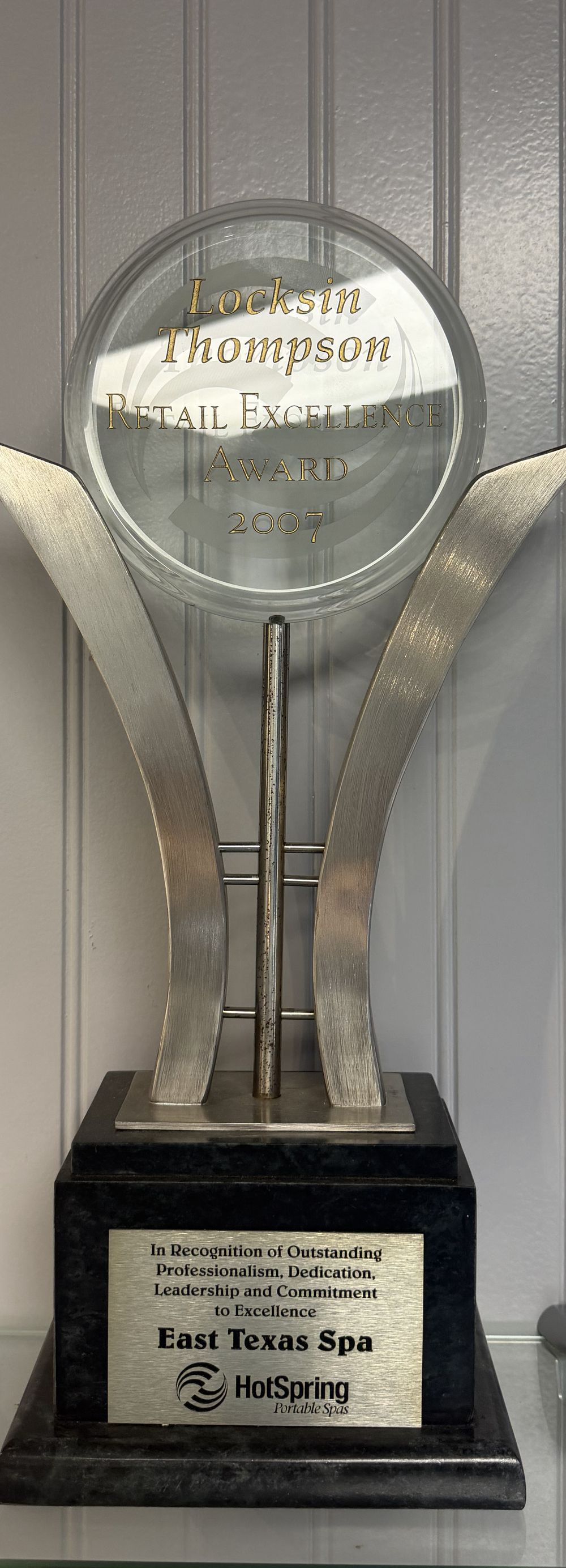 Locksin Thompson Retail Excellence Award trophy awarded to East Texas Hot Tub Company by Hot Spring